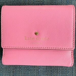 Kate Spade Vibrant Pink wallet. Looks new.